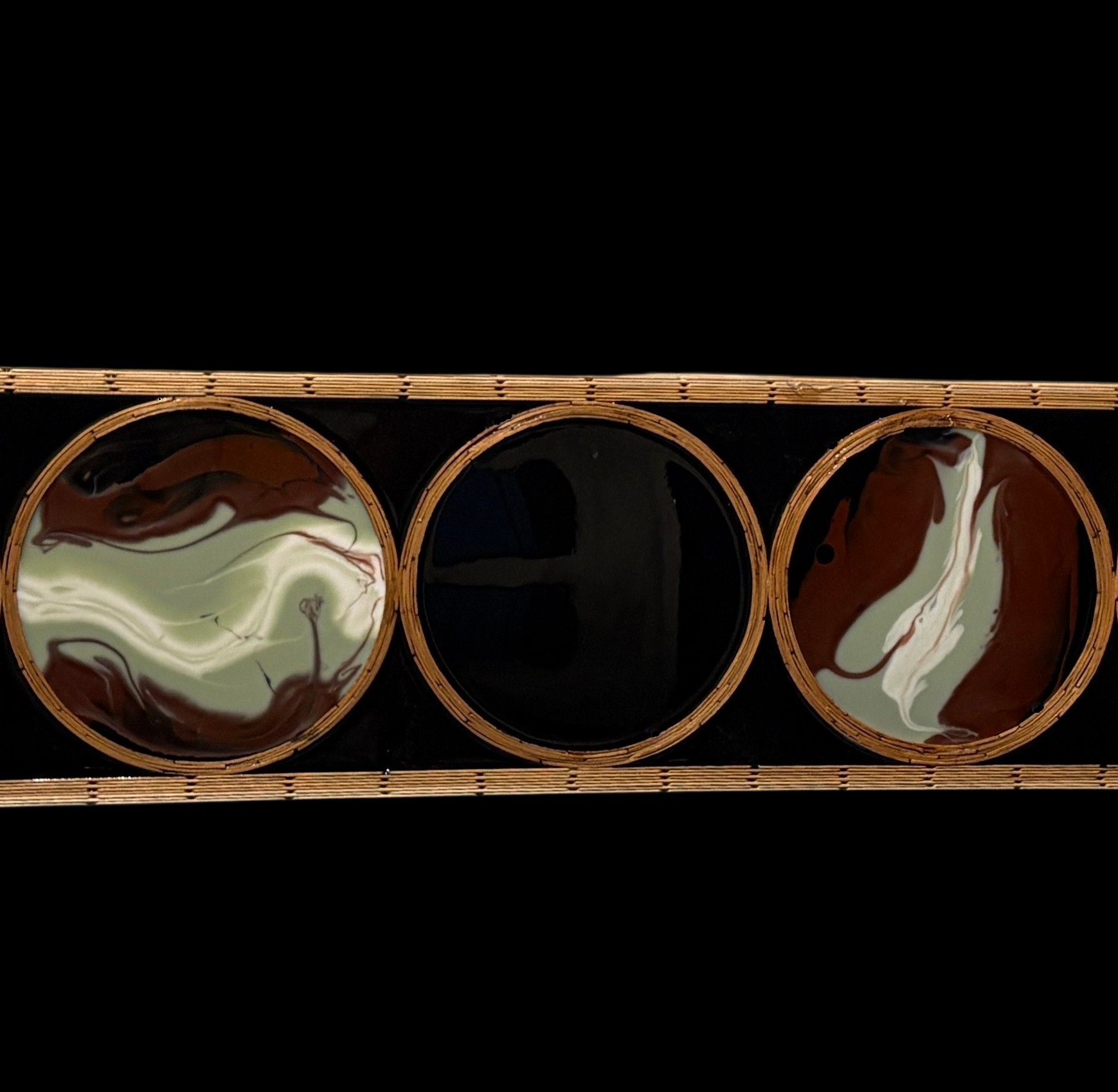 Detail of Crooked Into — three circular panels framed in craft sticks: two swirled resin panels in green, white and rust, with a black void between them