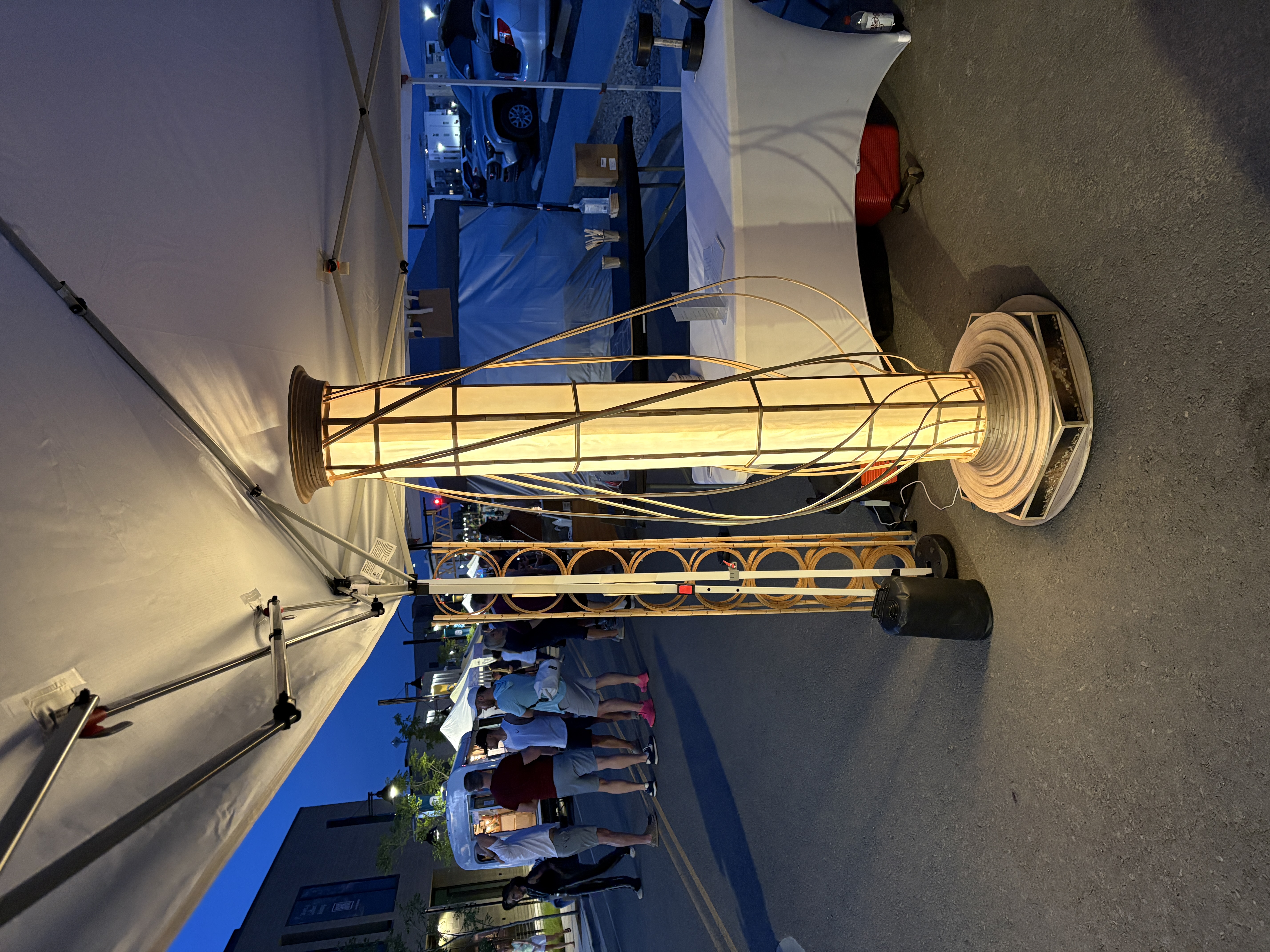 Vessel illuminated at dusk during Horizon Arts Festival